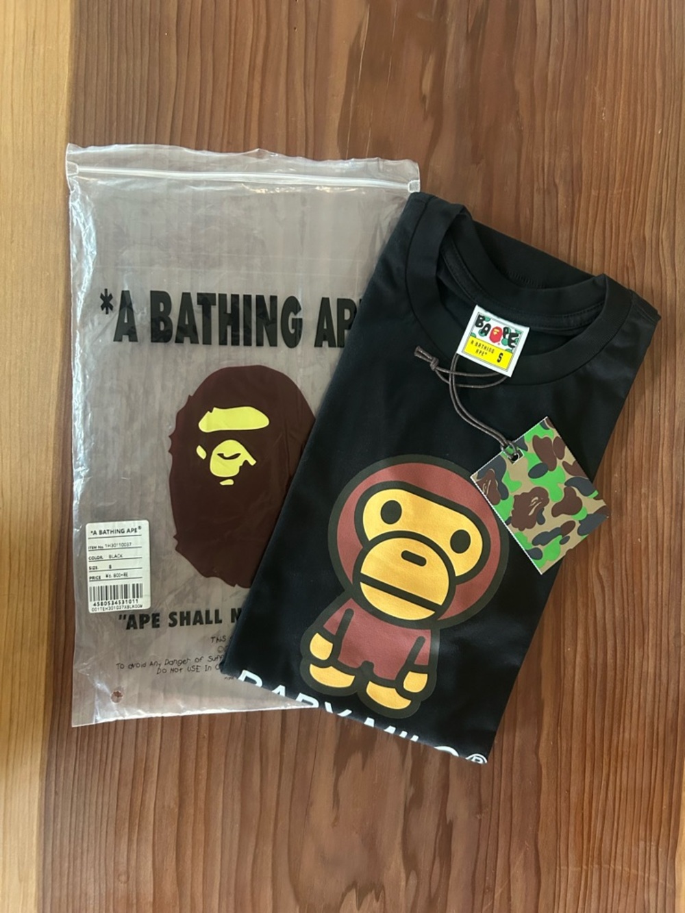 A Bathing Ape Black Graphic Tee in Multicolor Ape Logo